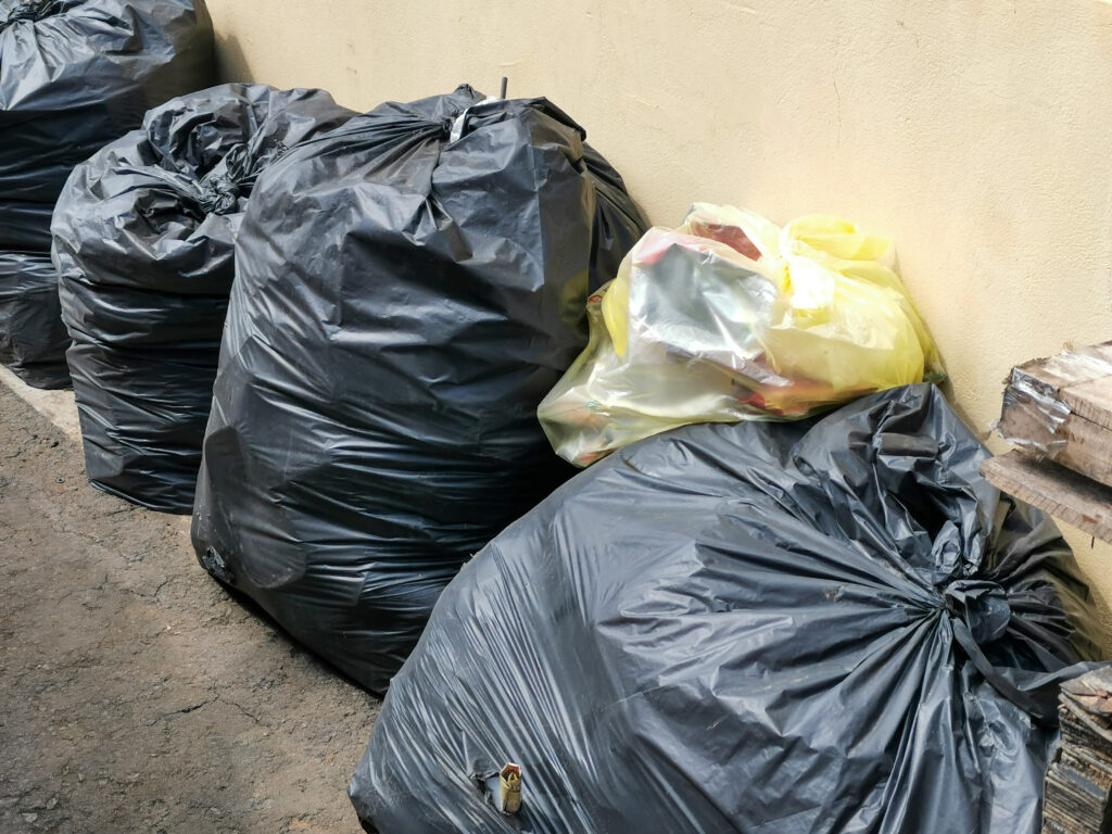 huge amounts black garbage bags on the factory flo 2025 01 07 06 09 00 utc