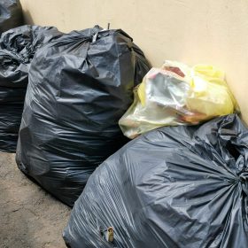 huge-amounts-black-garbage-bags-on-the-factory-flo-2025-01-07-06-09-00-utc